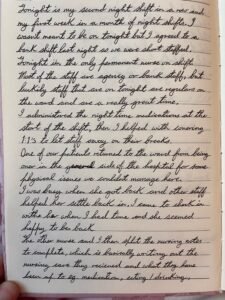 An open notebook with handwriting on it.